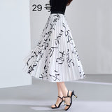 2025 New High-Rise Half-Dress Woman Tight Waist Ink Print Design Sense A-Character Skirt In The Long Folded Skirt