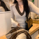 Unique Fake Two-Piece Hanging Neck Long-Sleeved Knitted Bottom Shirt Women Autumn 2025 New High-End Sesame V-Neck Top