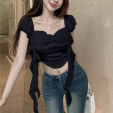 [] Solid Color Splicing Trend Drift Belt Vest Female Pure Lust Wind Lotus Leaf Side Design Slings