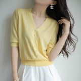 Short-Sleeved Ice Silk Knitted Women's 2026 Summer New Pearl Buckle Design Small Loose Thin Top