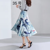 2025 New High-Rise Half-Dress Woman Tight Waist Ink Print Design Sense A-Character Skirt In The Long Folded Skirt