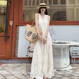 French Tea Winding V-Neck Sleeveless White Dress Women's Summer Loose And Thin Lazy Texture Long Holiday Dress