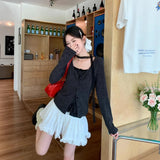 Pure Style Temperament Fashion Suit Autumn 2026 New Cardigan Sling Vest Two Sets Of Tide
