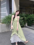 Summer New French Thin Small Fresh Dress Light Green Seaside Vacation Sling Skirt Mid-Long Model 2026