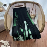 2025 New High-Rise Half-Dress Woman Tight Waist Ink Print Design Sense A-Character Skirt In The Long Folded Skirt