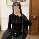 2026 Early Spring Ferrous Black Metal Buckle Round-Neck Long-Sleeved T-Shirt Femininity New Round-Neck Knitted Shirt