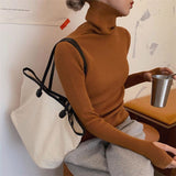 Heap High-Necked Cover Finger Tight-Up Sweater Women 2026 Autumn And Winter New Knitted Bottom Shirt Full Of Long Sleeve Tops